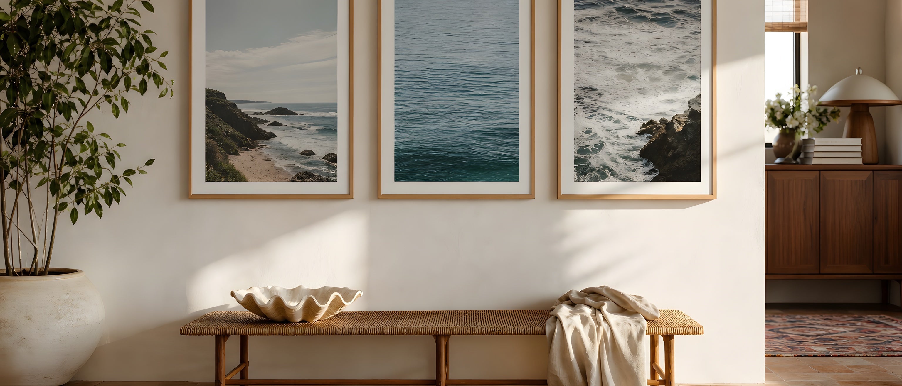 Coastal Wall Art — editorial interior scene with framed prints